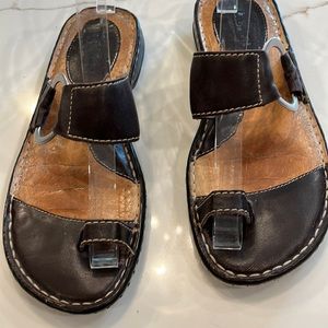 Born Sandals. Worn but still have wear left in them. Brown. Size 6 comfortable